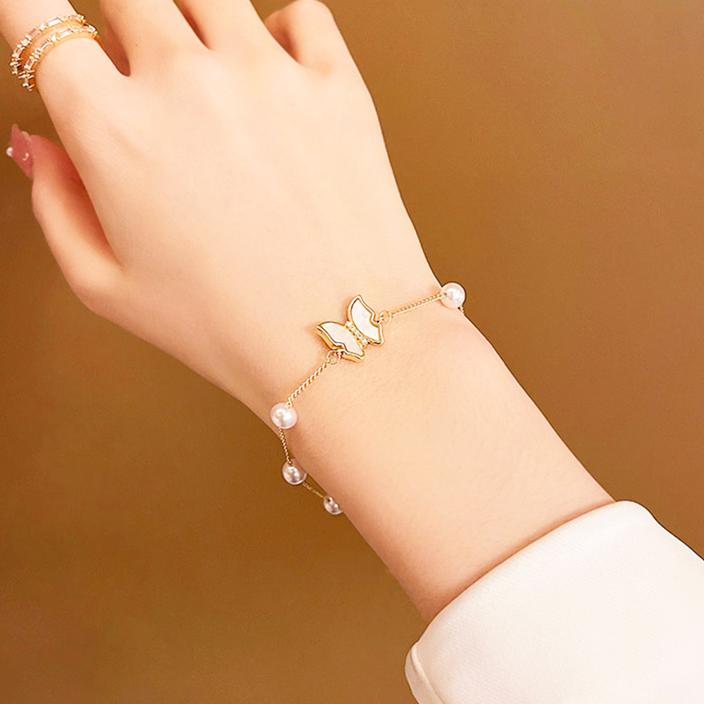 蝶々模様パール付きゴールドバングル