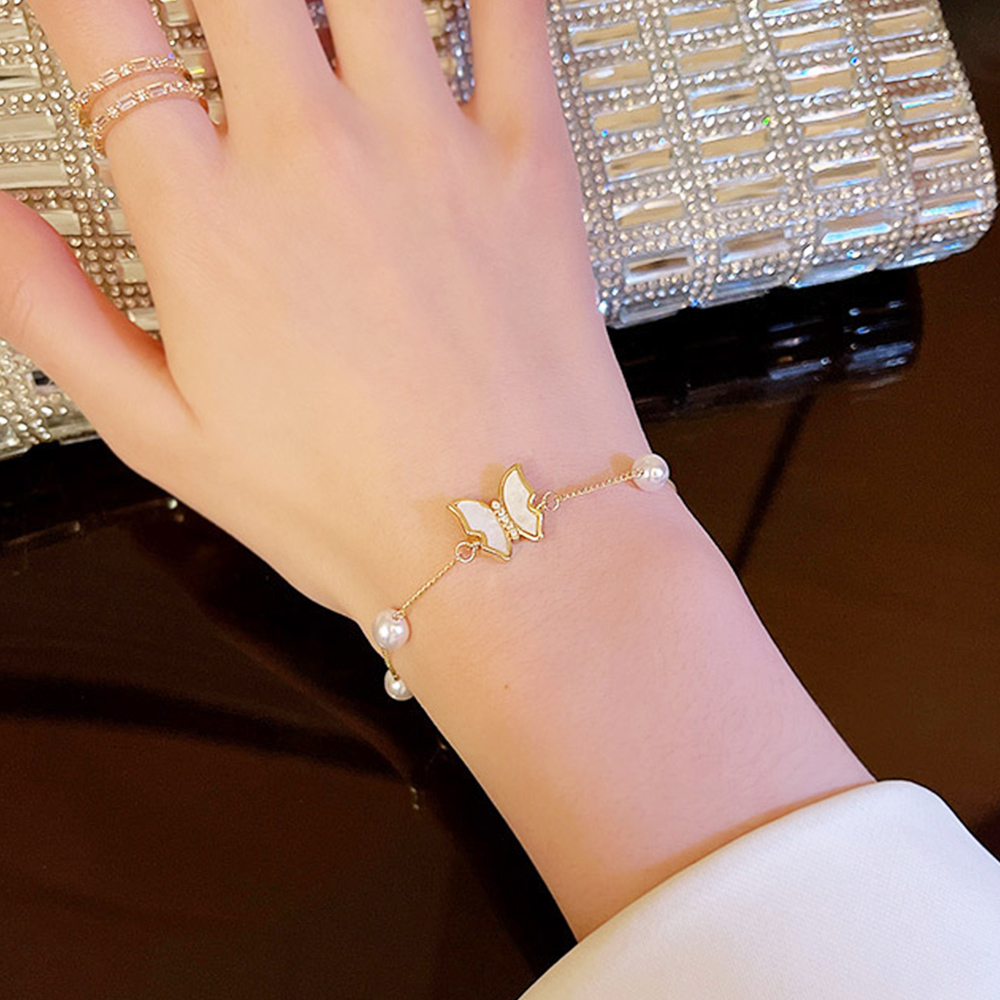 蝶々模様パール付きゴールドバングル
