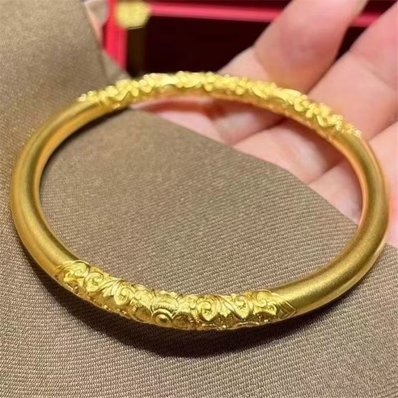 バングル 唐草模様が美しい細工入り丸型腕輪