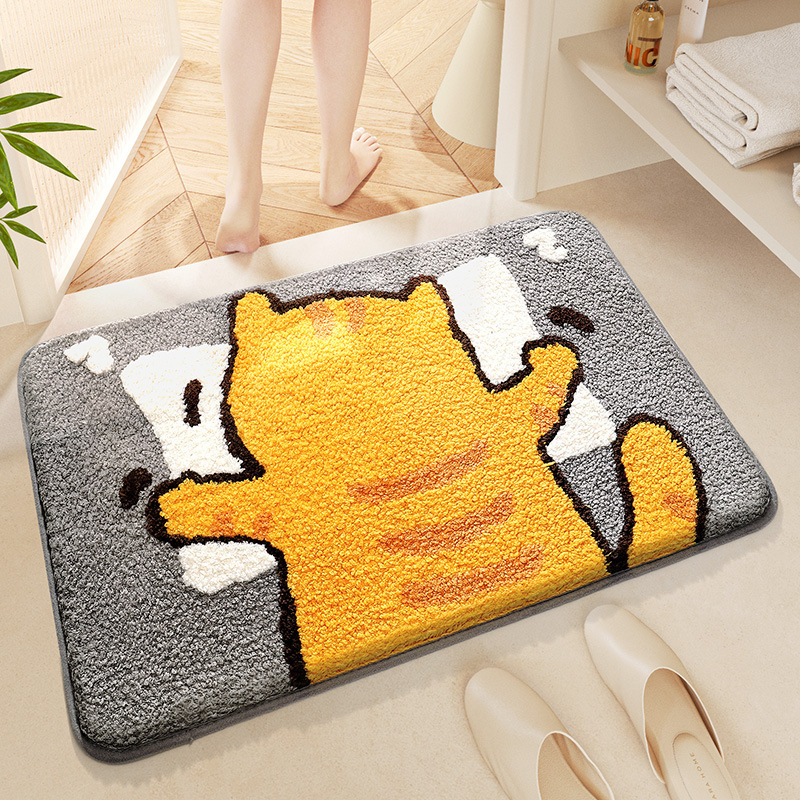 かえるとドット模様のバスマット
### ふわふわのポリエステル素材で、愛らしいカエルの顔が特徴のバスマット。白いドット模様が散りばめられ、可愛らしさを引き立てています。
吸水性に優れた機能性と、インテリアのアクセントにもなるデザイン性を兼ね備えています。