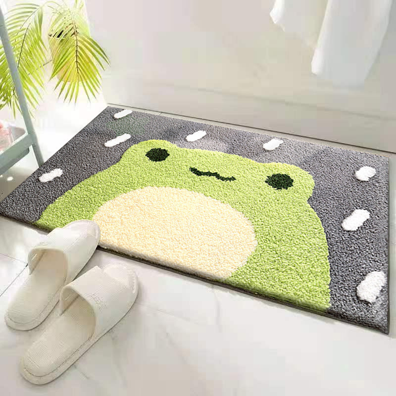 かえるとドット模様のバスマット
### ふわふわのポリエステル素材で、愛らしいカエルの顔が特徴のバスマット。白いドット模様が散りばめられ、可愛らしさを引き立てています。
吸水性に優れた機能性と、インテリアのアクセントにもなるデザイン性を兼ね備えています。