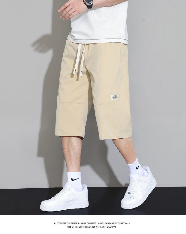 ベージュパンツ 調整紐付きゆったりフィット七分丈カーゴハーフパンツ