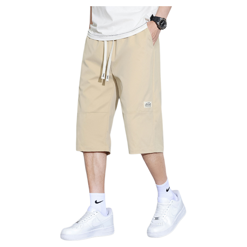 ベージュパンツ 調整紐付きゆったりフィット七分丈カーゴハーフパンツ