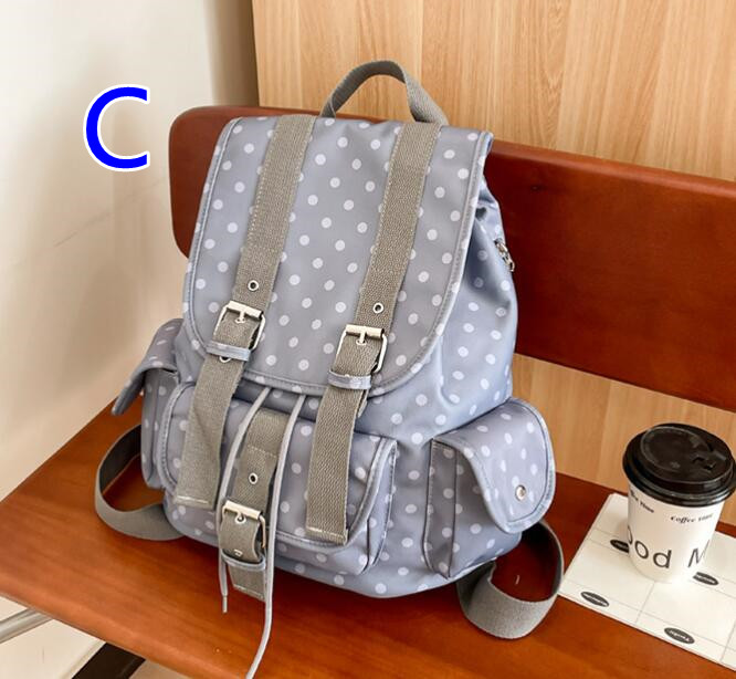 水玉模様大容量リュックサック通学斜めがけ対応