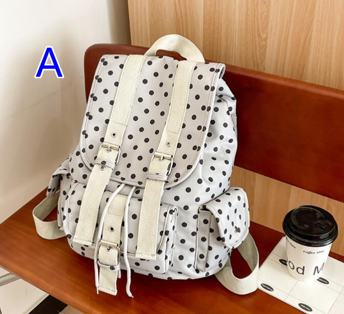 水玉模様大容量リュックサック通学斜めがけ対応