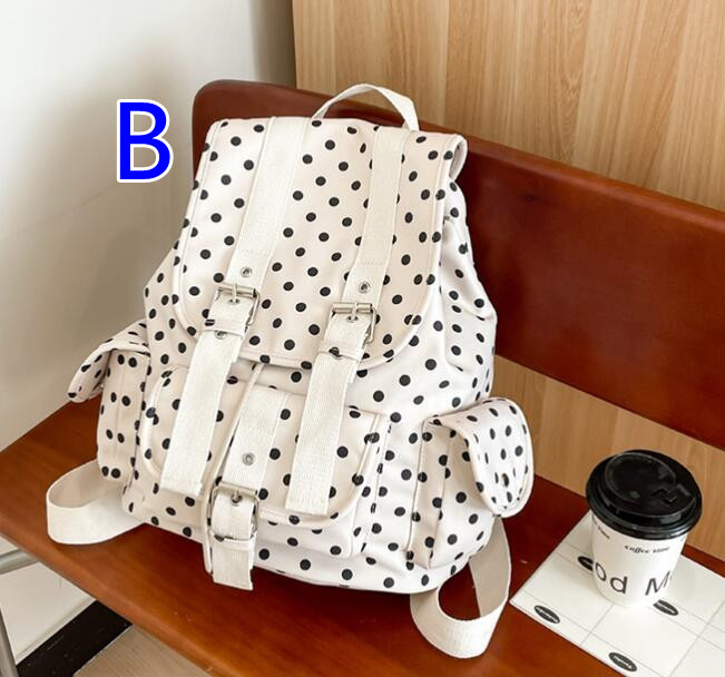 水玉模様大容量リュックサック通学斜めがけ対応