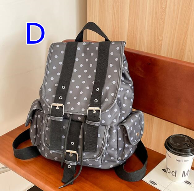 水玉模様大容量リュックサック通学斜めがけ対応