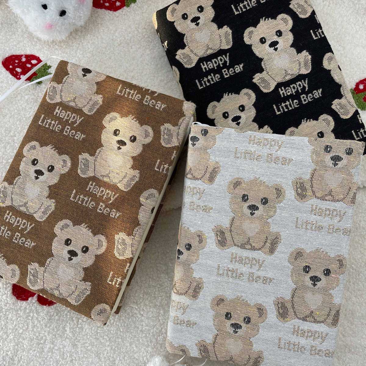 ブックカバー くまさん織り模様の布製カバー