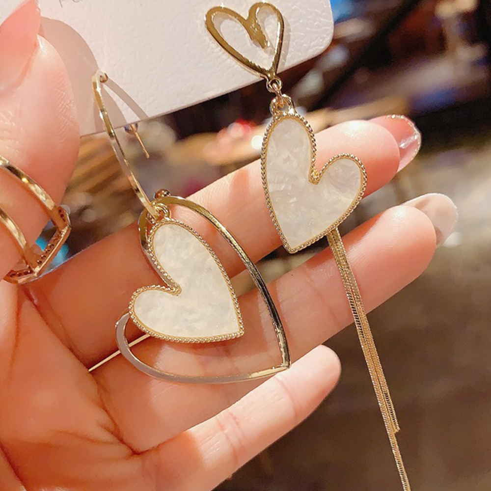 結婚式 アクセサリー 左右非対称ハートピアス 揺れる女性用ピアス