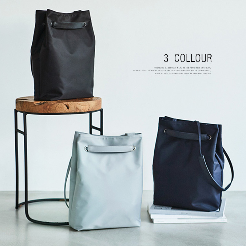 パソコンケース 巾着型レザー調パソコン収納バッグ