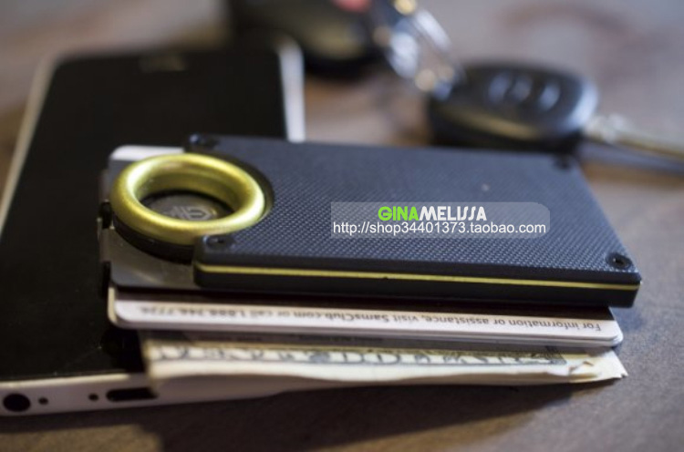 マネークリップ 精密なテクスチャー加工のハンドル・鮮やかなアクセントリングが印象的