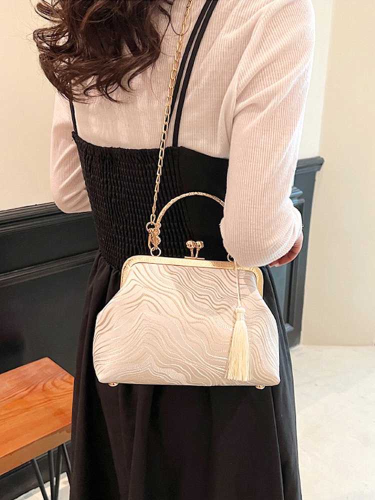 チェーン バッグ がま口刺繍タッセル付きミニバッグ