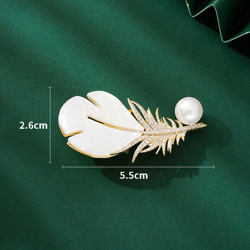 コサージュ 卒業式 羽根と真珠の上品な金属製コサージュ