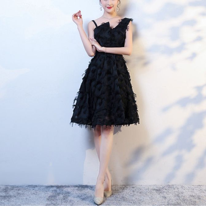 キャバドレス 羽根モチーフ立体装飾ノースリーブ膝丈ワンピース