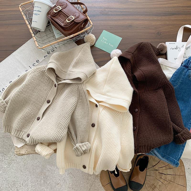 キッズファッション ぽんぽん付きフード一体型ニットカーディガン