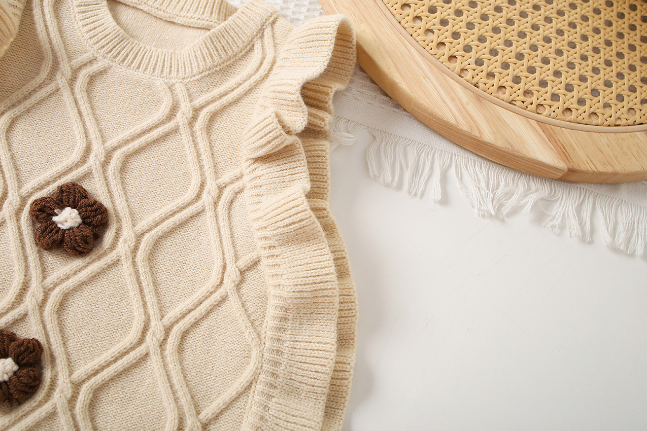 キッズファッション 立体ケーブル編みお花モチーフ付きニットセーター