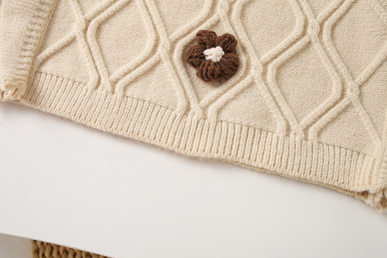 キッズファッション 立体ケーブル編みお花モチーフ付きニットセーター