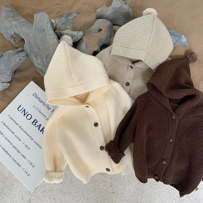 キッズファッション ぽんぽん付きフード一体型ニットカーディガン