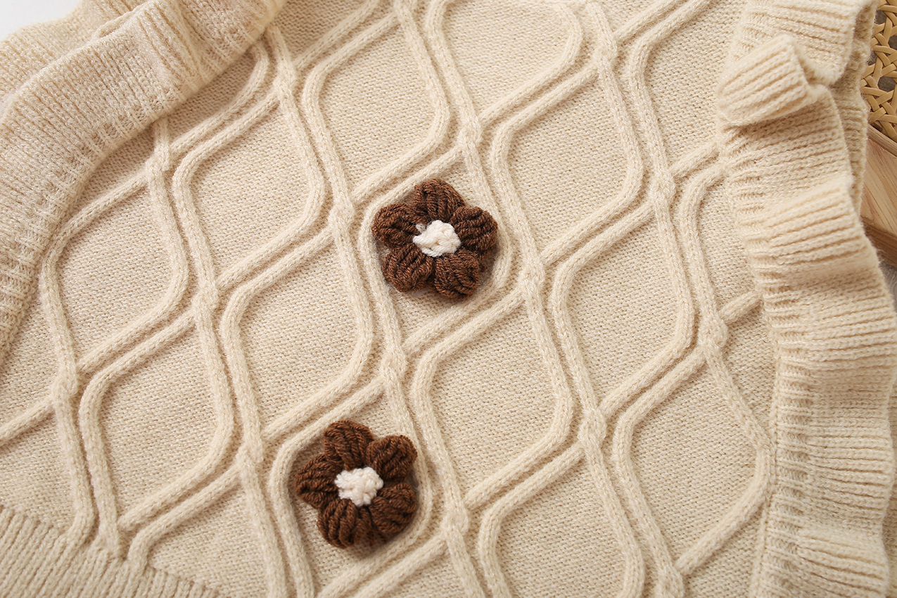 キッズファッション 立体ケーブル編みお花モチーフ付きニットセーター