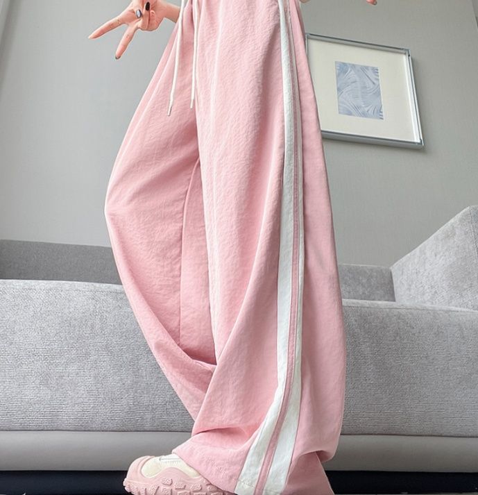 フレアパンツ ゆったりサイドライン入りフレアパンツ