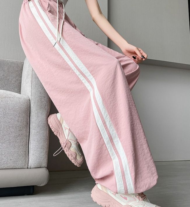 フレアパンツ ゆったりサイドライン入りフレアパンツ