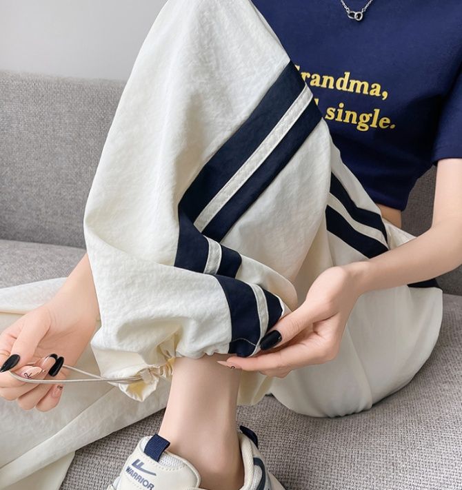 フレアパンツ ゆったりサイドライン入りフレアパンツ