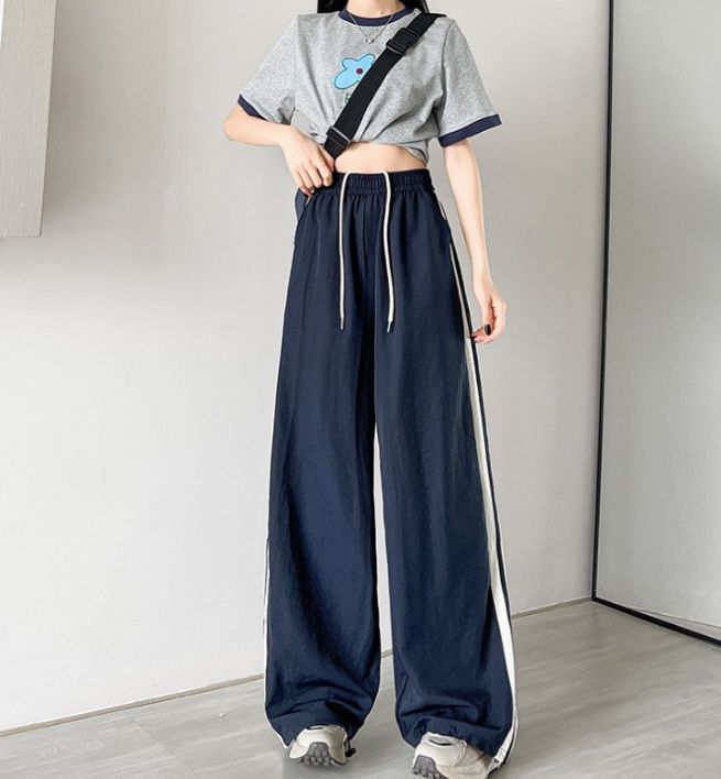フレアパンツ ゆったりサイドライン入りフレアパンツ