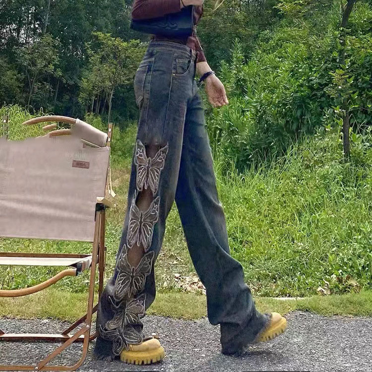 フレアパンツ 蝶々模様のカットアウトフレアパンツ