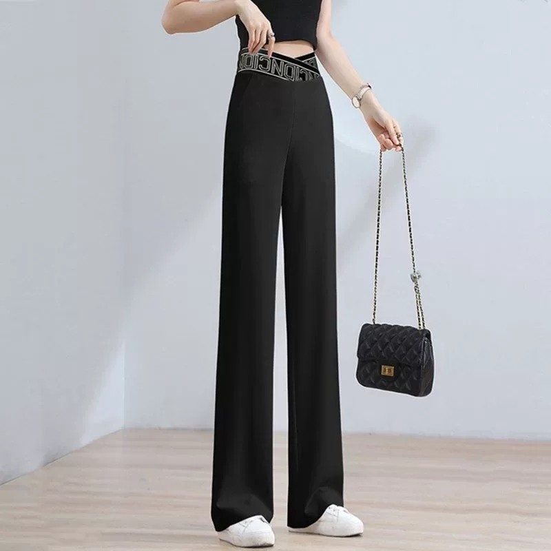 フレアパンツ ロゴ入りウエストベルト付きフレアスラックス