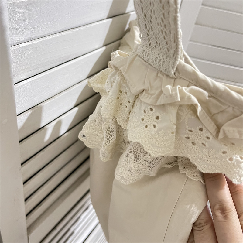 フリルバッグ幾重にも重なる刺繍レースフリルの縦型手提げ