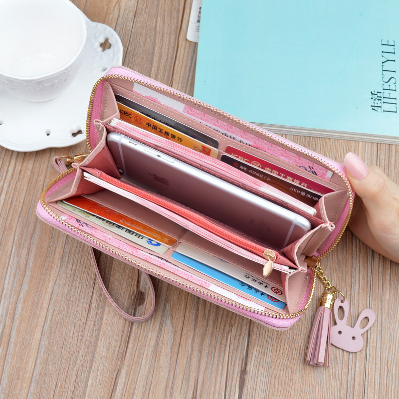 レディース二つ折り財布 タッセル付き上品レザー調ラウンドファスナー長財布