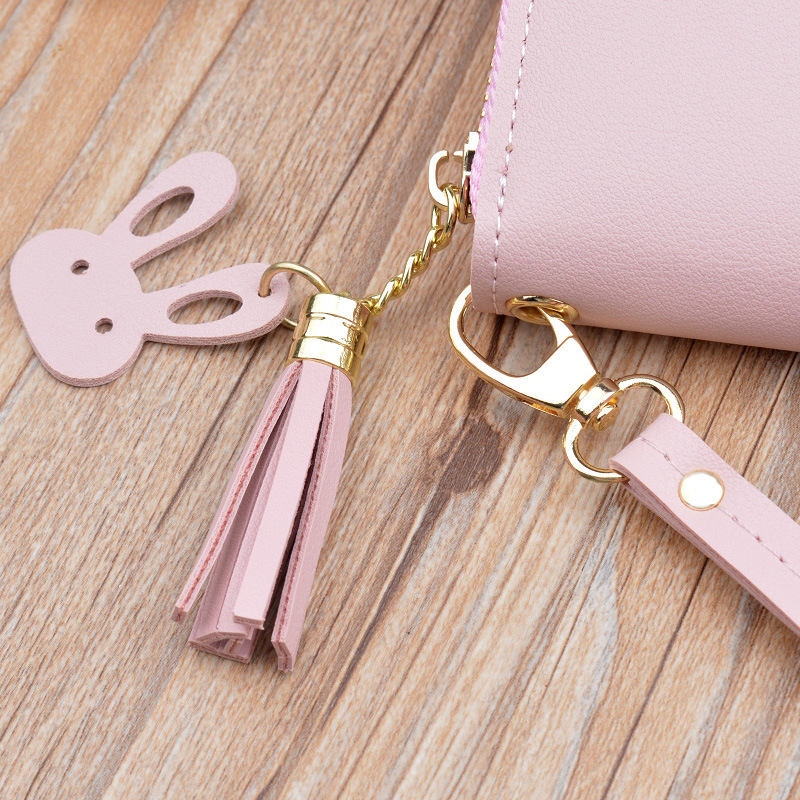 レディース二つ折り財布 タッセル付き上品レザー調ラウンドファスナー長財布