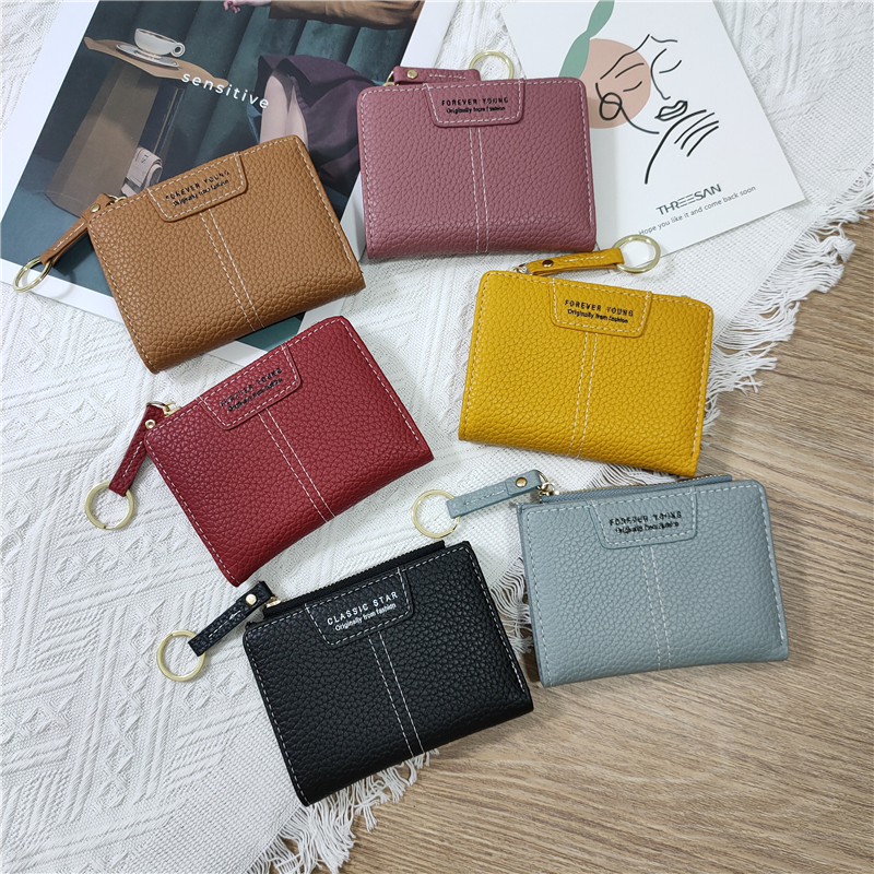 レディース二つ折り財布 型押しレザー金具付きコンパクト二つ折り財布