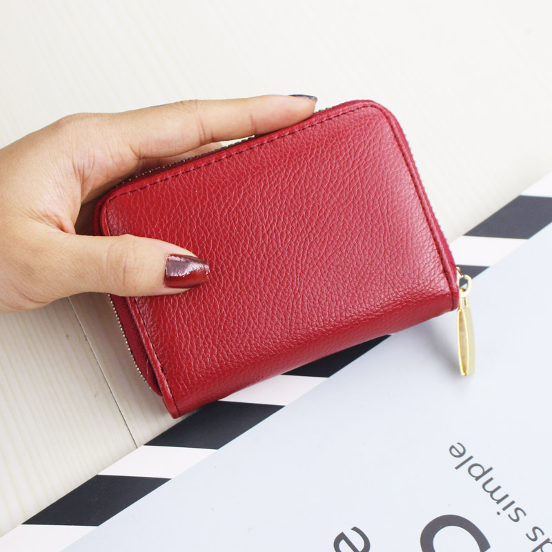 レディース二つ折り財布 ラウンドファスナー型レザー調ミニ財布