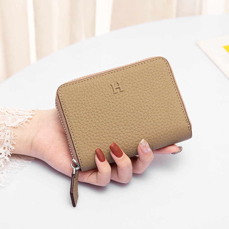 レディース二つ折り財布 型押しレザー ラウンドファスナー二つ折り財布