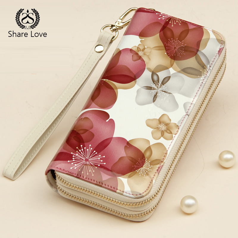 レディース二つ折り財布 花柄透明素材レディース二つ折り財布