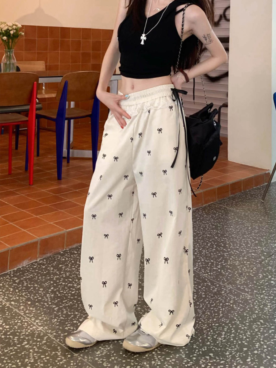 大人かわいい服 リボン刺繍レースフリル付きワイドパンツ