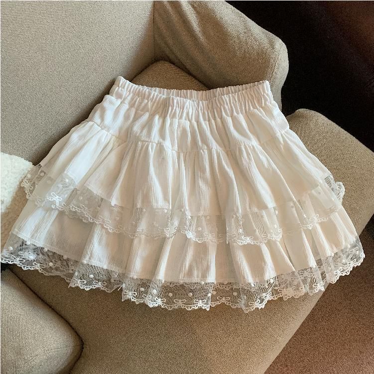 大人かわいい服 繊細レース裾ティアード透け感チュールスカート