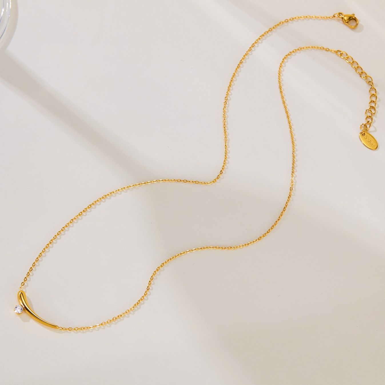 金 ネックレス 輝石付き曲線モチーフレディースネックレス