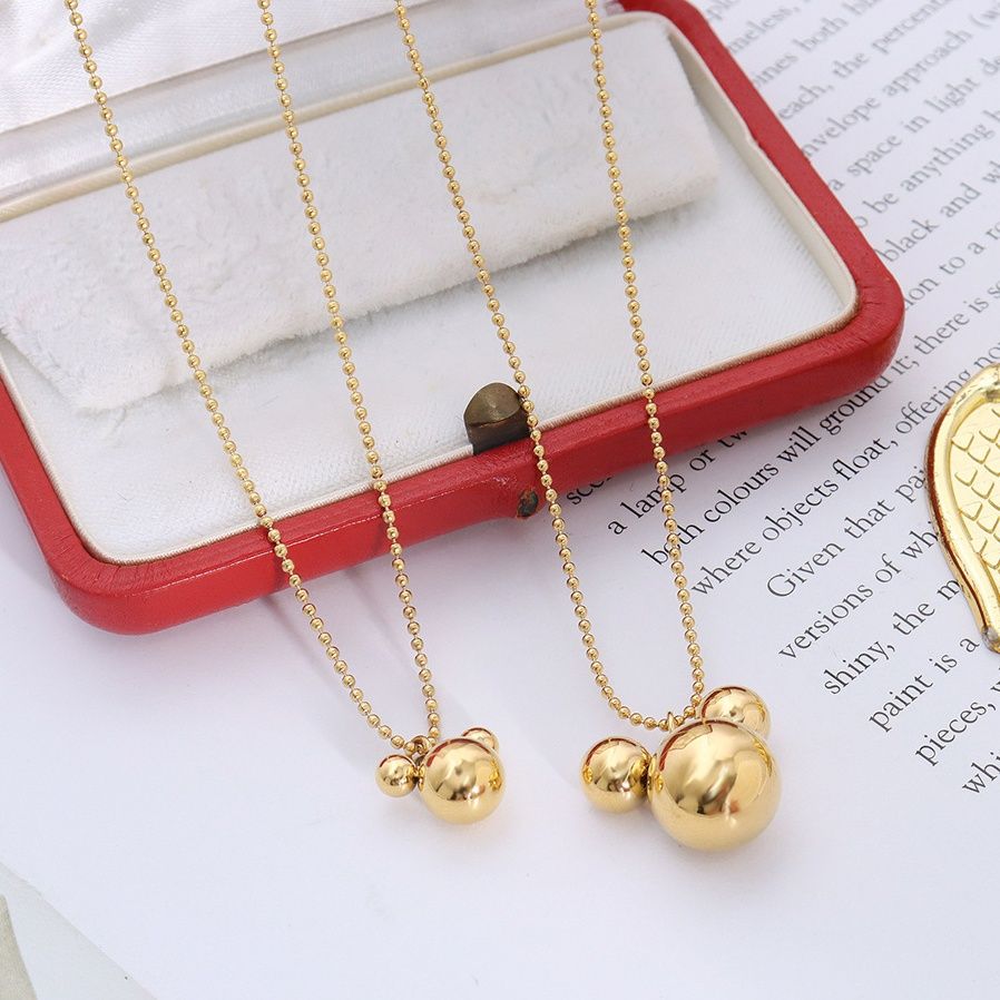 金 ネックレス 二重層重ね付け風丸型チャーム付きネックレス