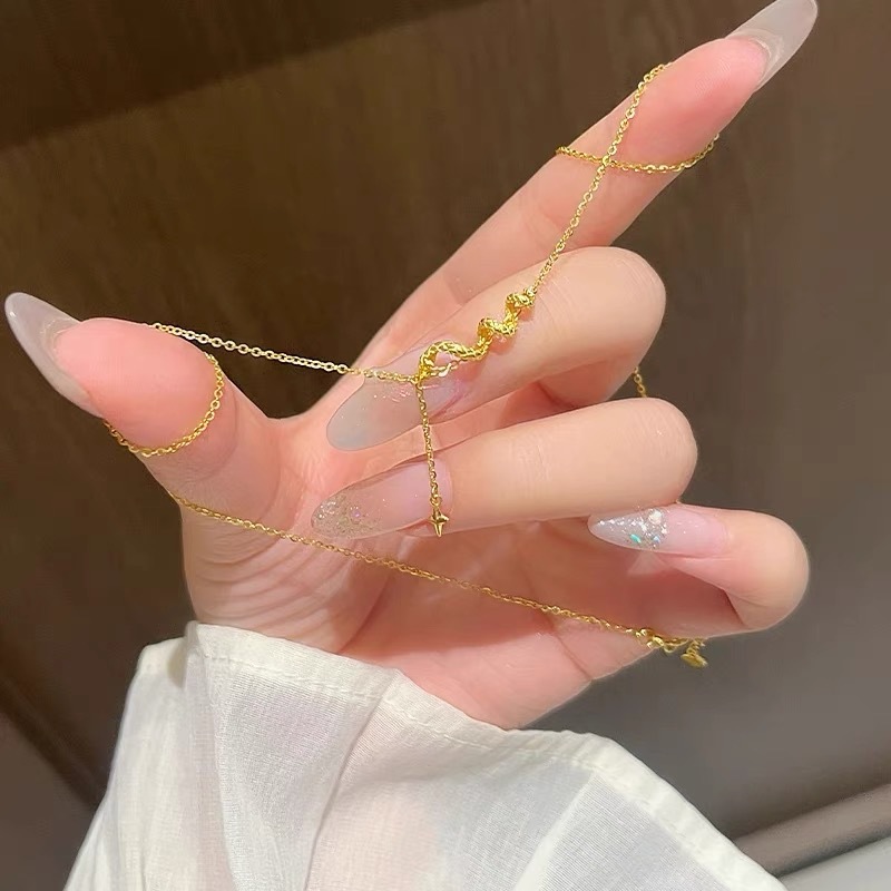 ゴールドネックレス うねりラインドロップネックレス