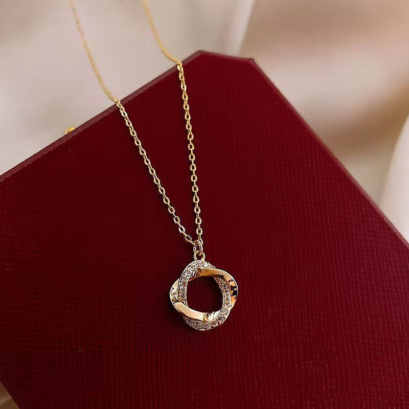 金 ネックレス ツイストサークルモチーフ華奢チェーンネックレス