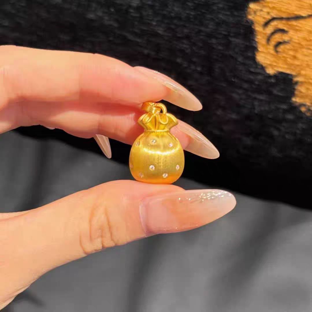 ゴールドアクセサリー 小粒宝石付き巾着ネックレス