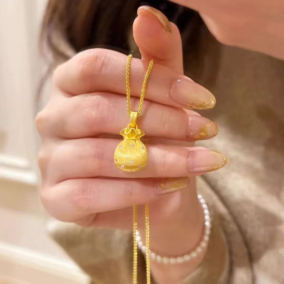 ゴールドアクセサリー 小粒宝石付き巾着ネックレス