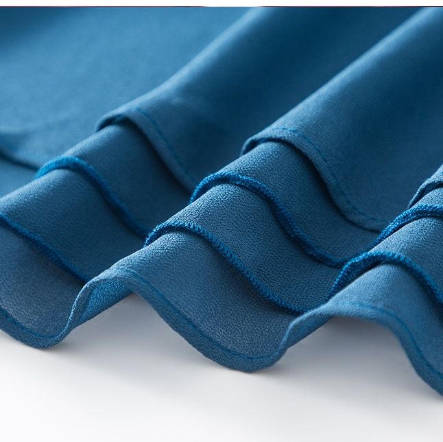 きれいめカジュアル 上品な巻きリボン付きロングフレアスカート