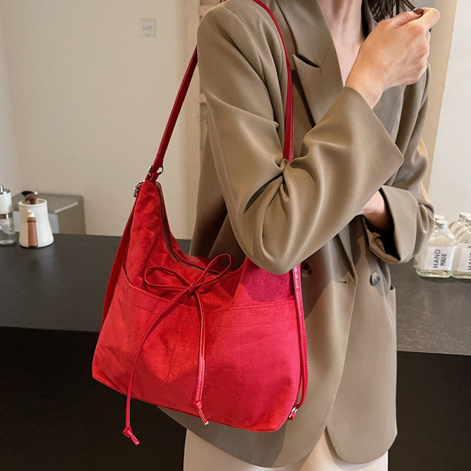 きれいめカジュアル 二通り使い女性用巾着型バッグ肩掛け背負い両用上品仕様