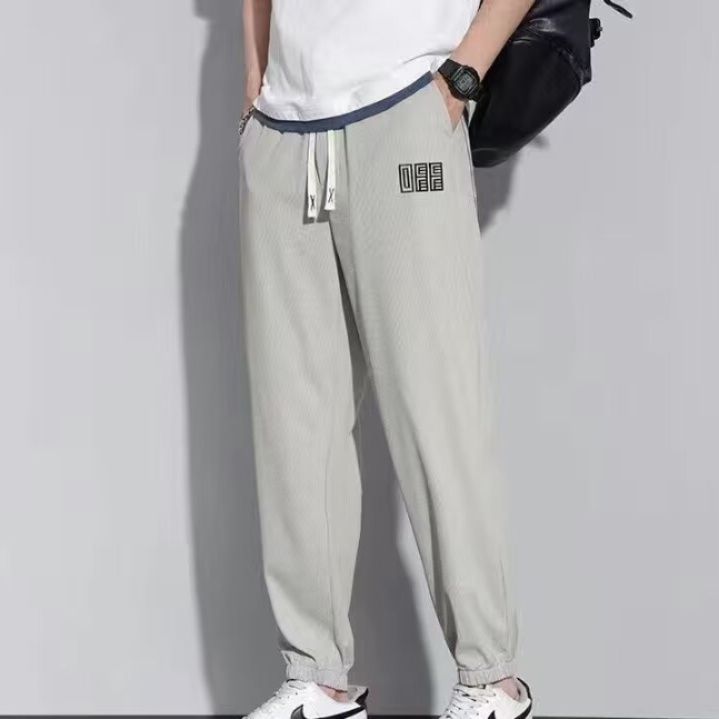 グレーパンツ 裾リブ調節紐付きゆったりシルエット運動着風ロングボトムス　スウェット