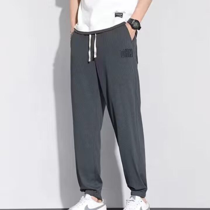 グレーパンツ 裾リブ調節紐付きゆったりシルエット運動着風ロングボトムス　スウェット