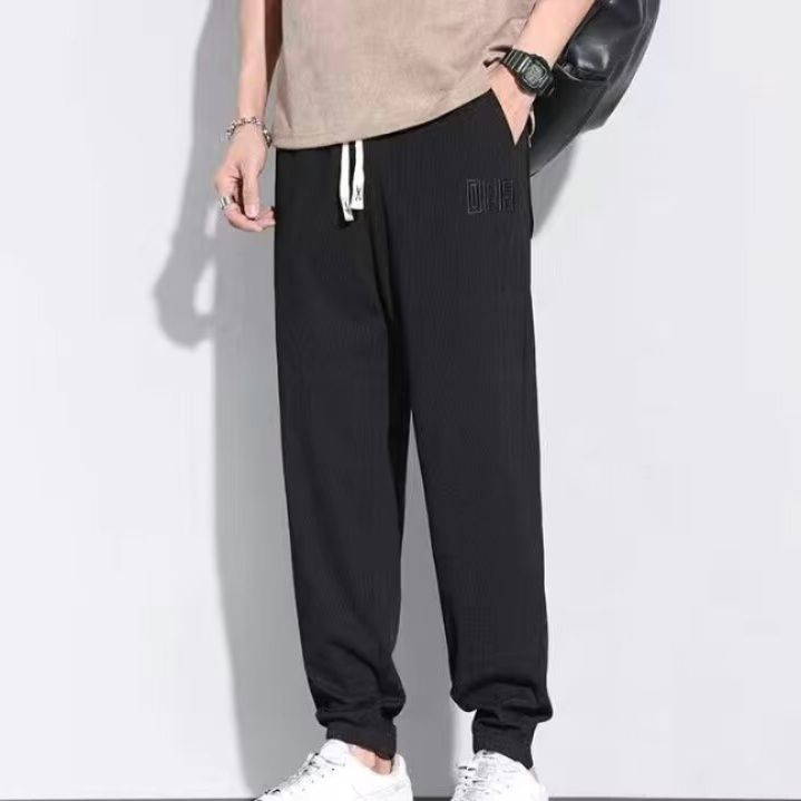 グレーパンツ 裾リブ調節紐付きゆったりシルエット運動着風ロングボトムス　スウェット