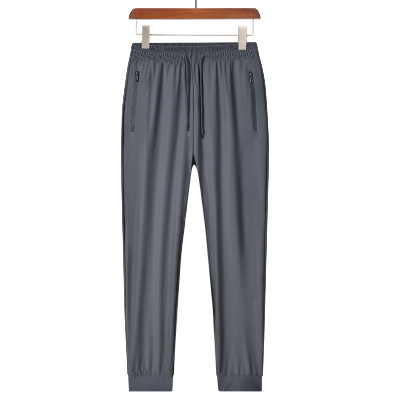 グレー パンツ 機能的ジップポケット付き裾リブイージースラックス